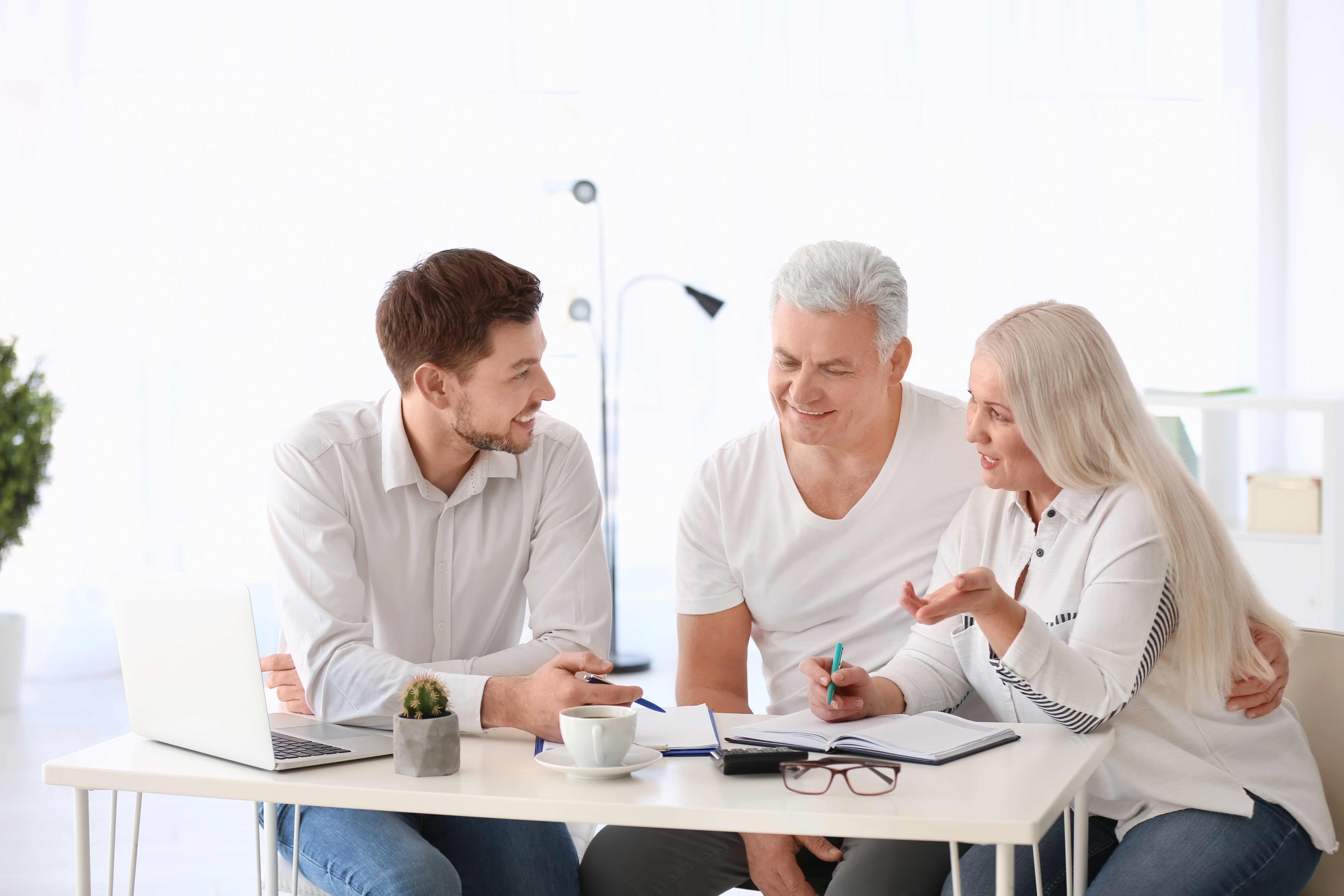 Family speaking with a consultant about home wellness systems