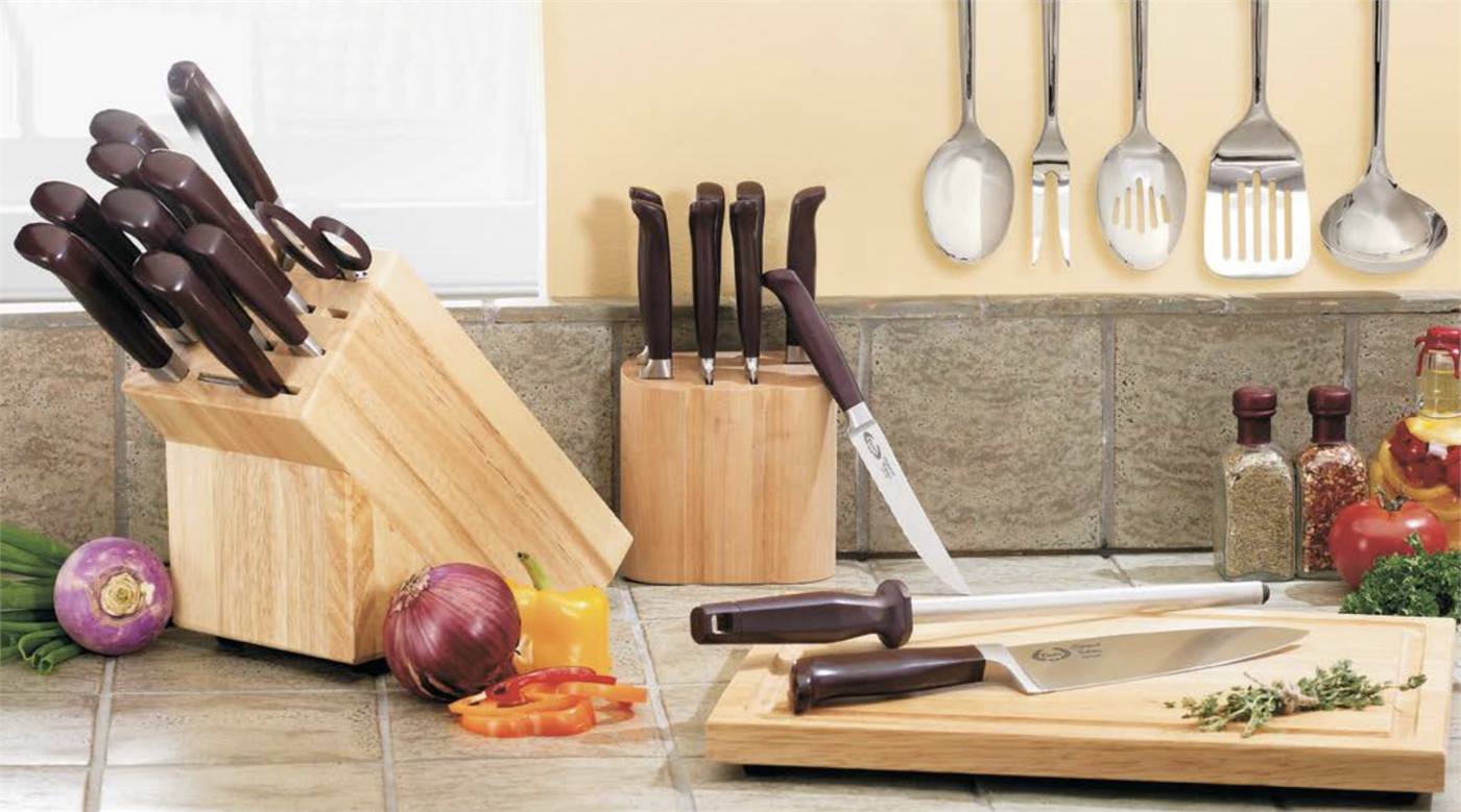 Premium chef knives on a cutting board in a modern kitchen
